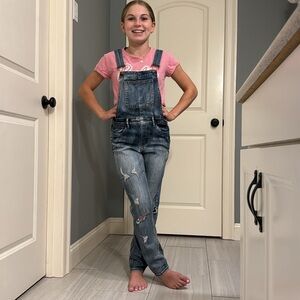 Dollhouse juniors skinny denim overalls.